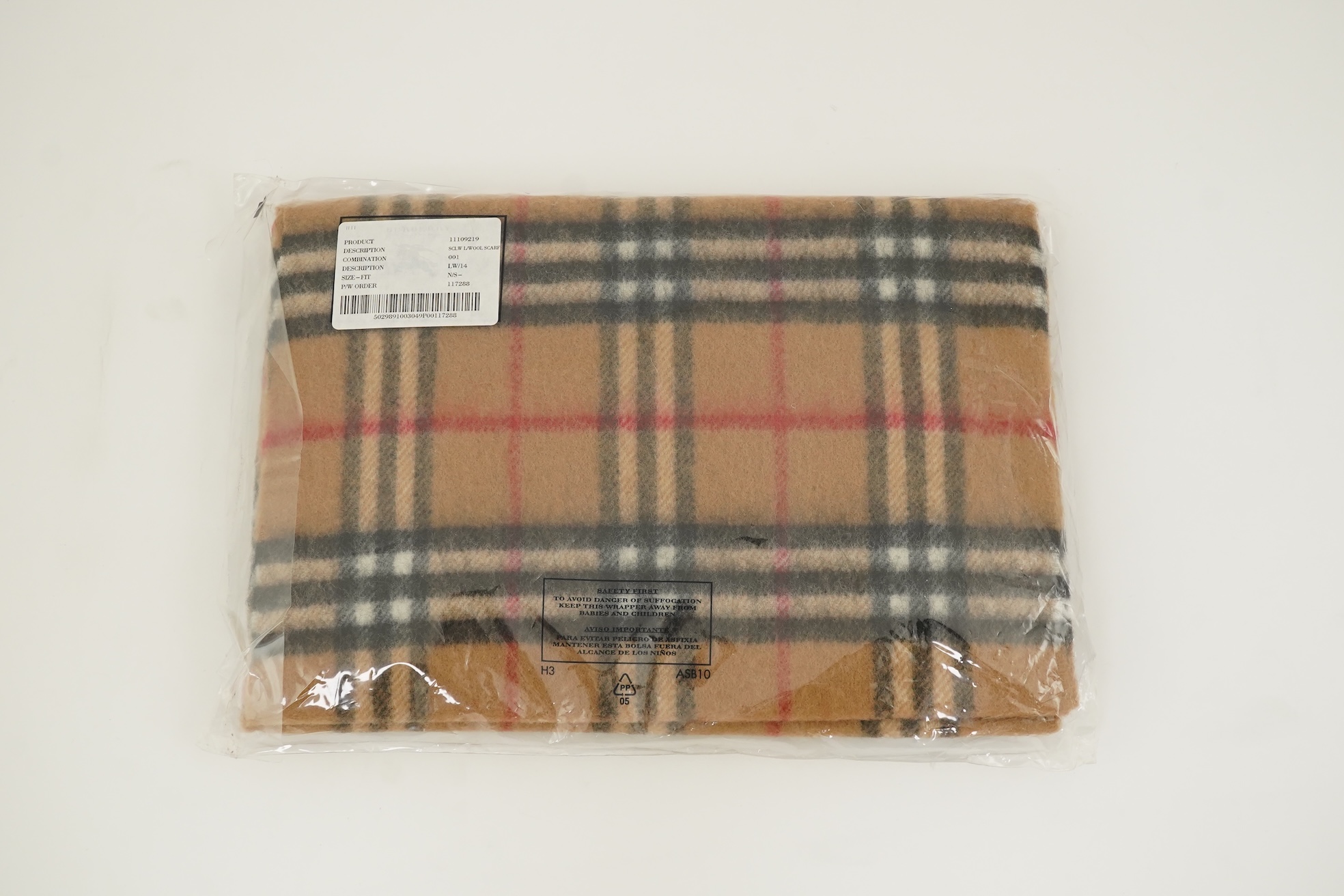 A Burberry brown tartan scarf, sunglasses with case and wallet with original box.